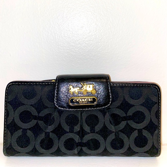 Coach Handbags - COACH clutch wallet with snap closure.  Approx 3x7.  Black and gold